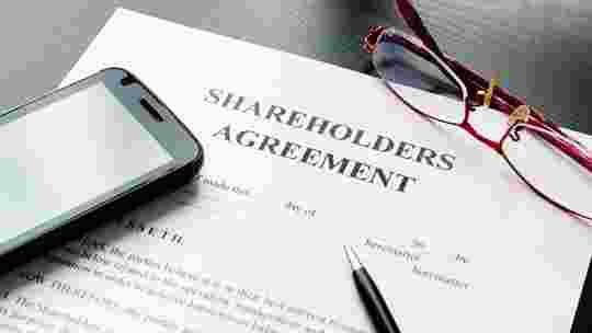 How do you transfer shares after the death of a shareholder?